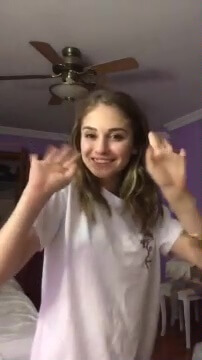 Schoolgirl dancing striptease